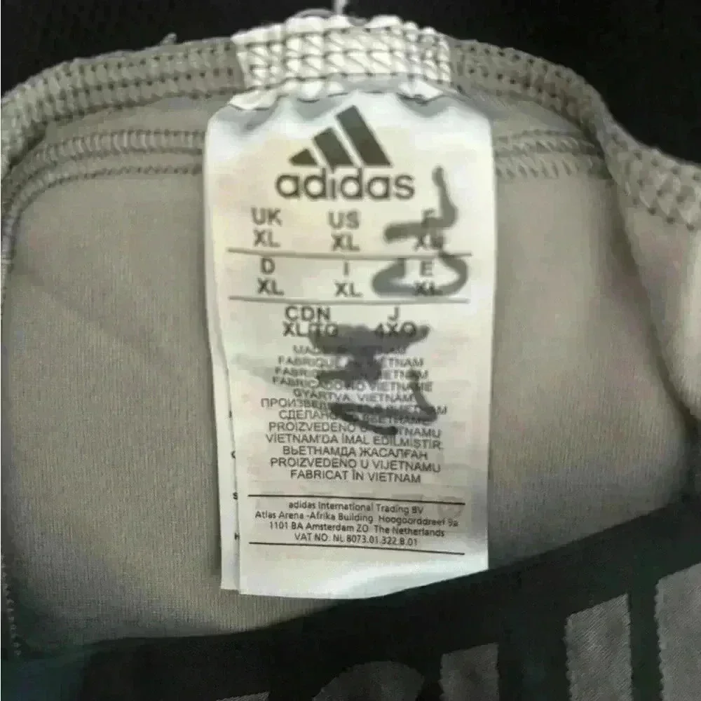Adidas tech fit men’s XL padded compression football shorts